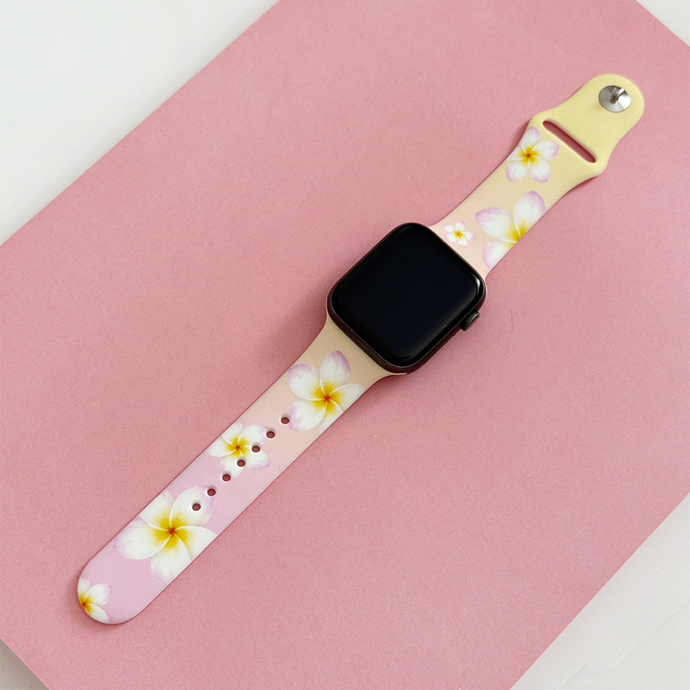 Pink Apple Watch Strap with white flowers.