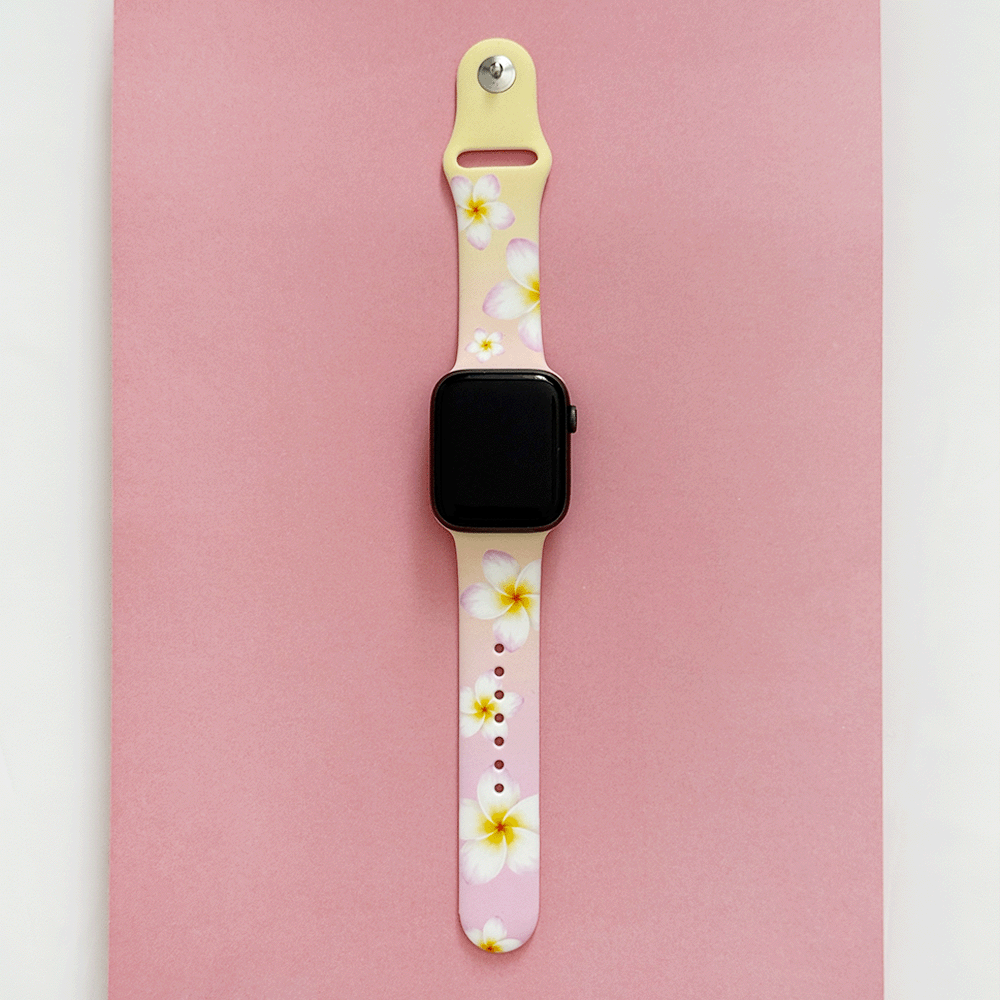 Pink Apple Watch Strap with white flowers.