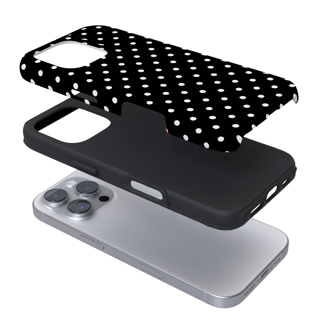 Expanded view of a phone case with a black and white polka dot pattern on a white background