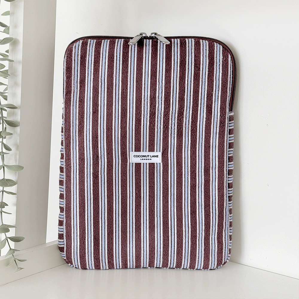 Brown, white and blue striped iPad Sleeve with silver zip and Coconut Lane logo badge.