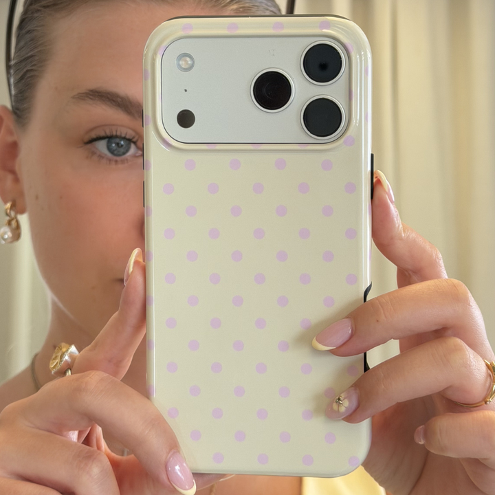 Girl taking mirror selfie up close with Butter Blush Tough Phone Case
