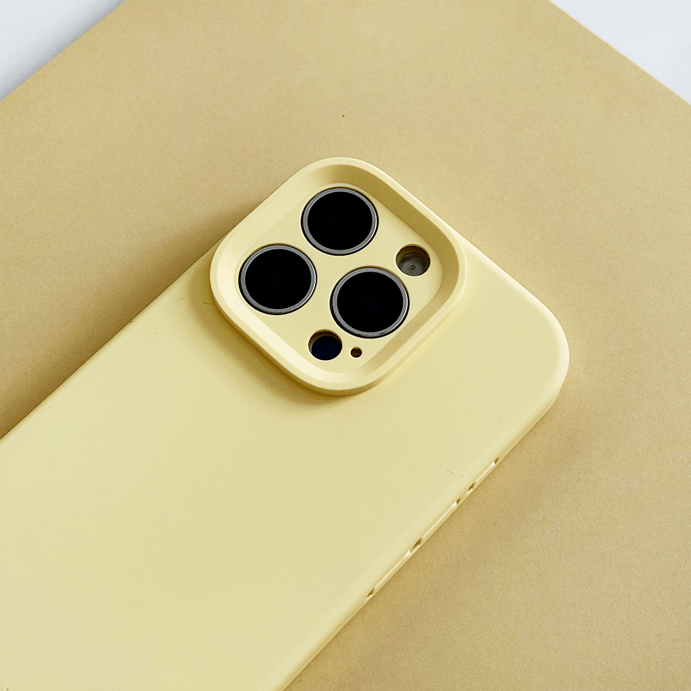 Yellow Phone Case with 'Coconut Lane' branding on a pink background.