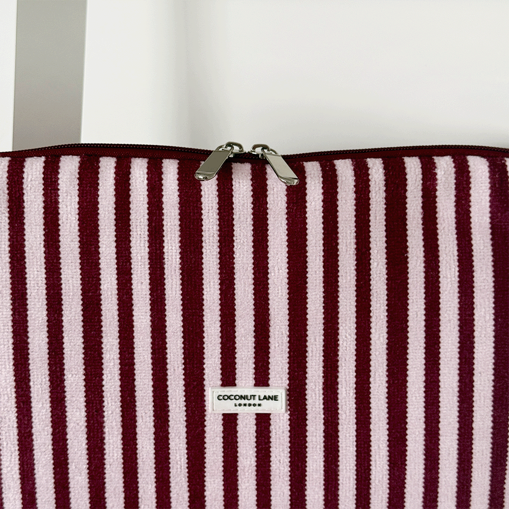 Burgundy and light pink striped Laptop Sleeve, with silver zip and Coconut Lane logo.