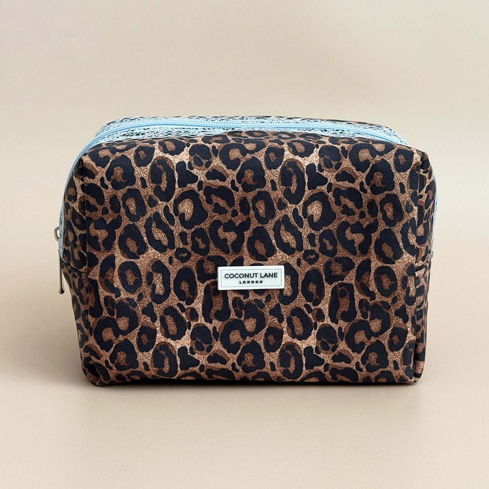 Coconut Lane Leopard Lace makeup bag featuring brown and black leopard print, pale blue lace trim and matching zip fastening.