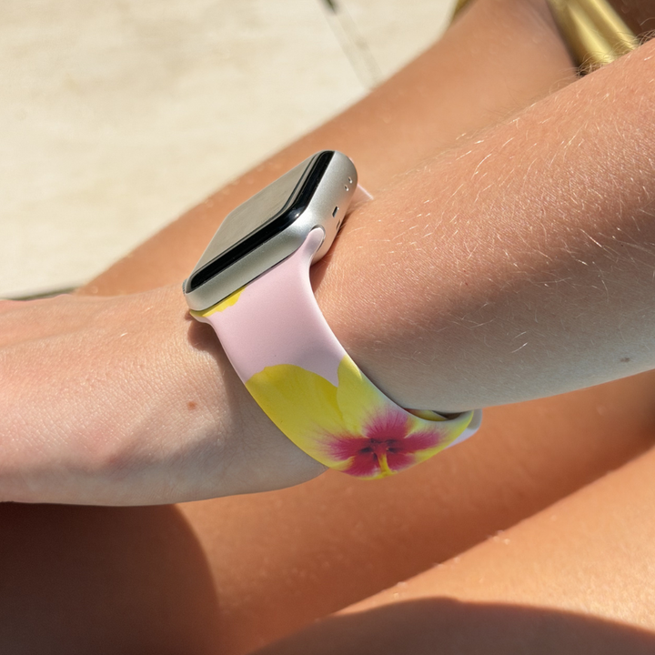 Girl in summer by pool with Hibiscus Crush Watch Strap on wrist