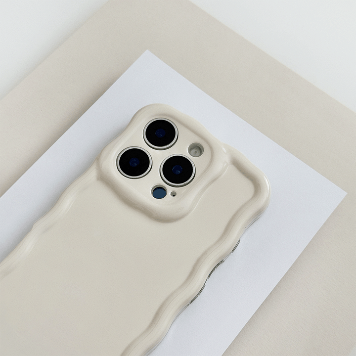 Plain creamy white coloured Phone Case with wavy edge effect.