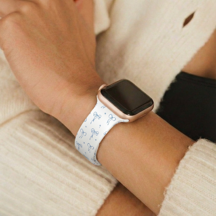 Girl crossing arms in cream cardigan wearing Bluebell Bows Watch Strap perfect for Spring